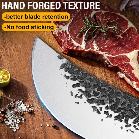 Huusk knife in kitchen on cutting board demonstrating controlled rocking cuts