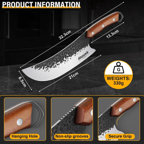 Huusk knife next to hand showing scale and comfortable balanced weight
