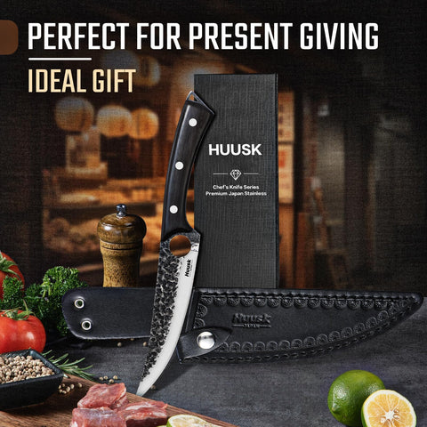 Huusk knife next to ruler comparing 6-inch blade for size and control