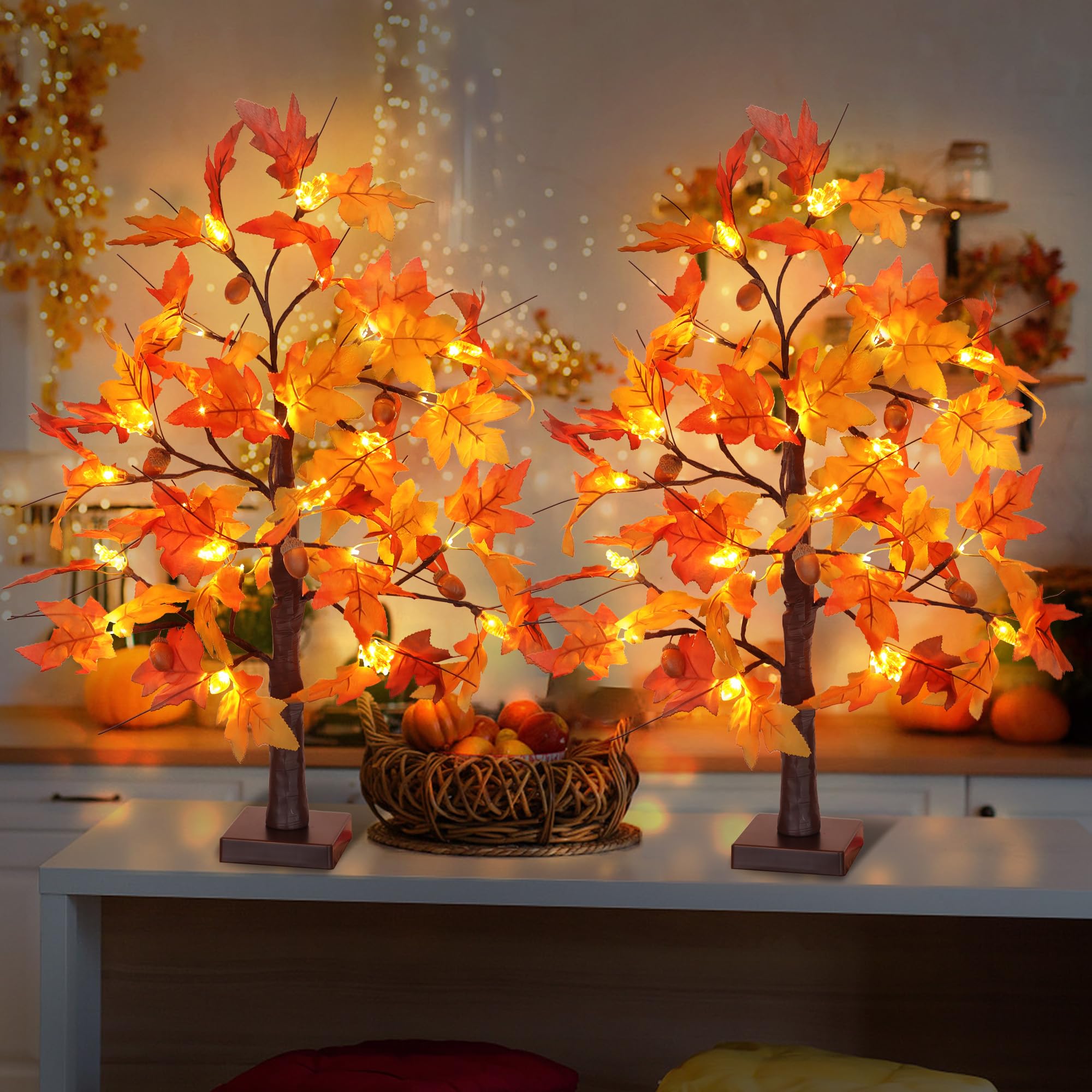 Huyamap two trees on a mantel adding warm seasonal charm