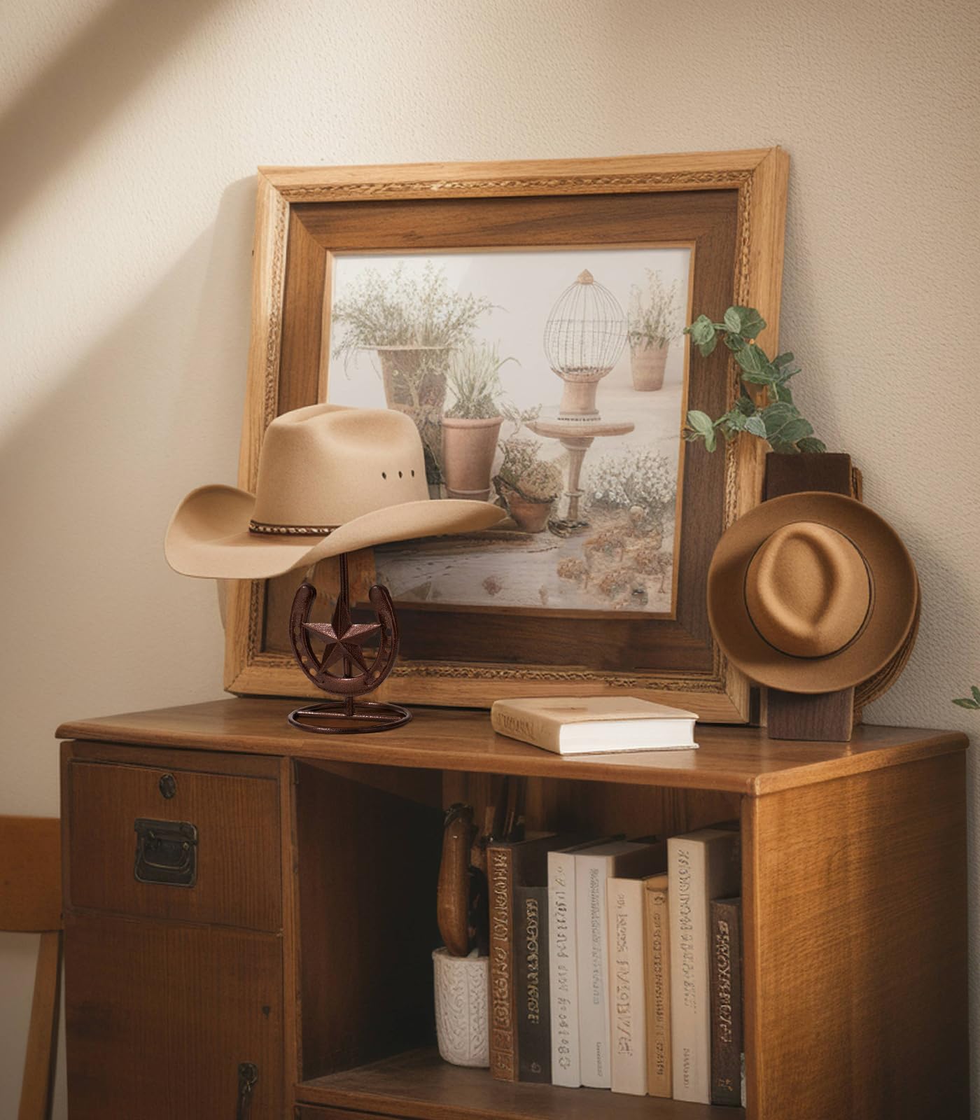 HYDERMUS next to a book to show compact scale and portability