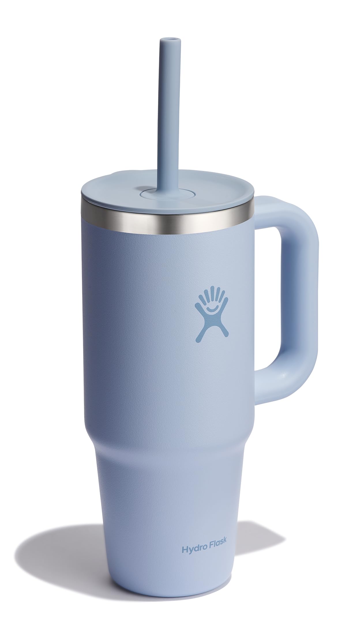 Hydro Flask 24 oz fitting car cupholder demonstrating convenient travel fit