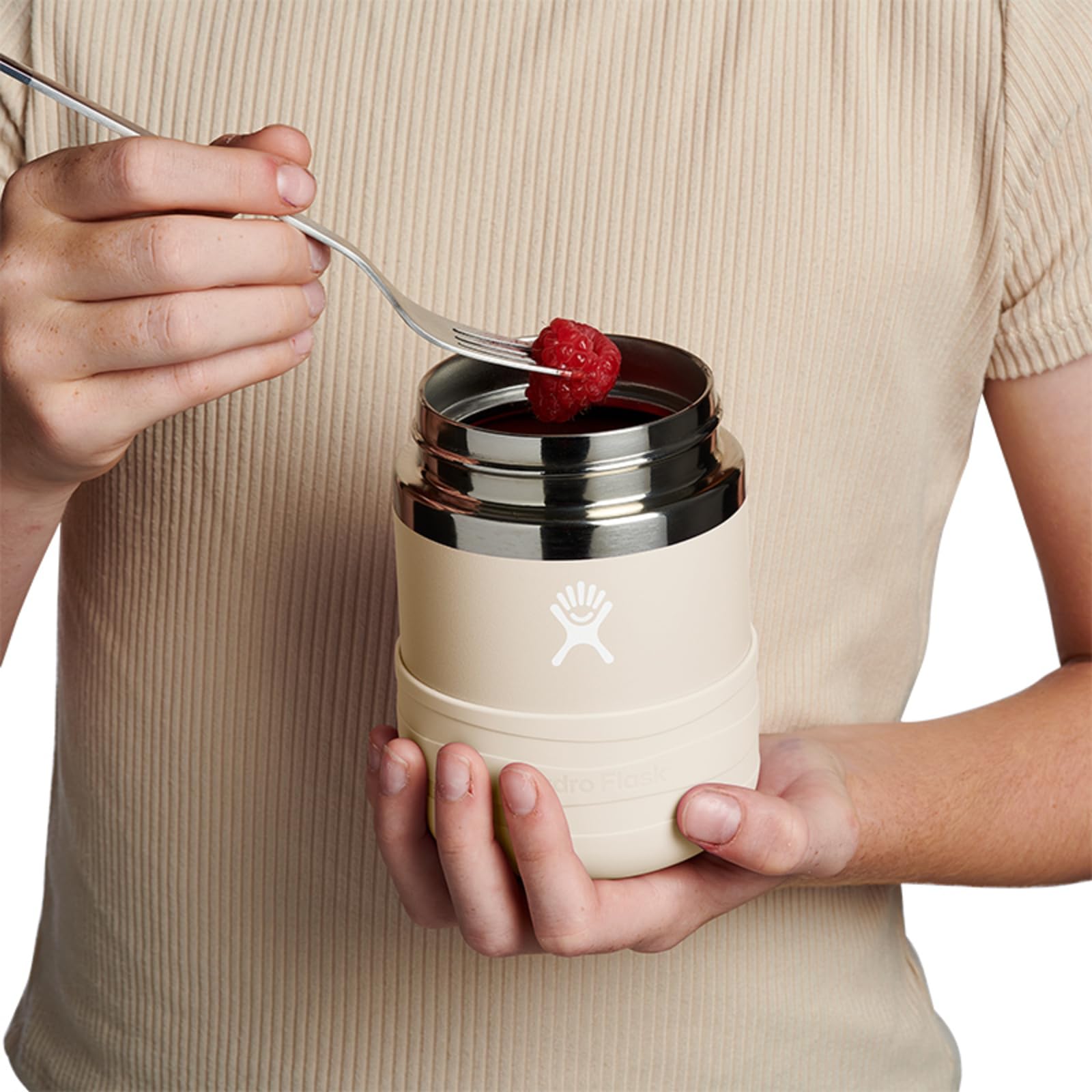 Hydro Flask inside backpack demonstrating portable leakproof benefit for school