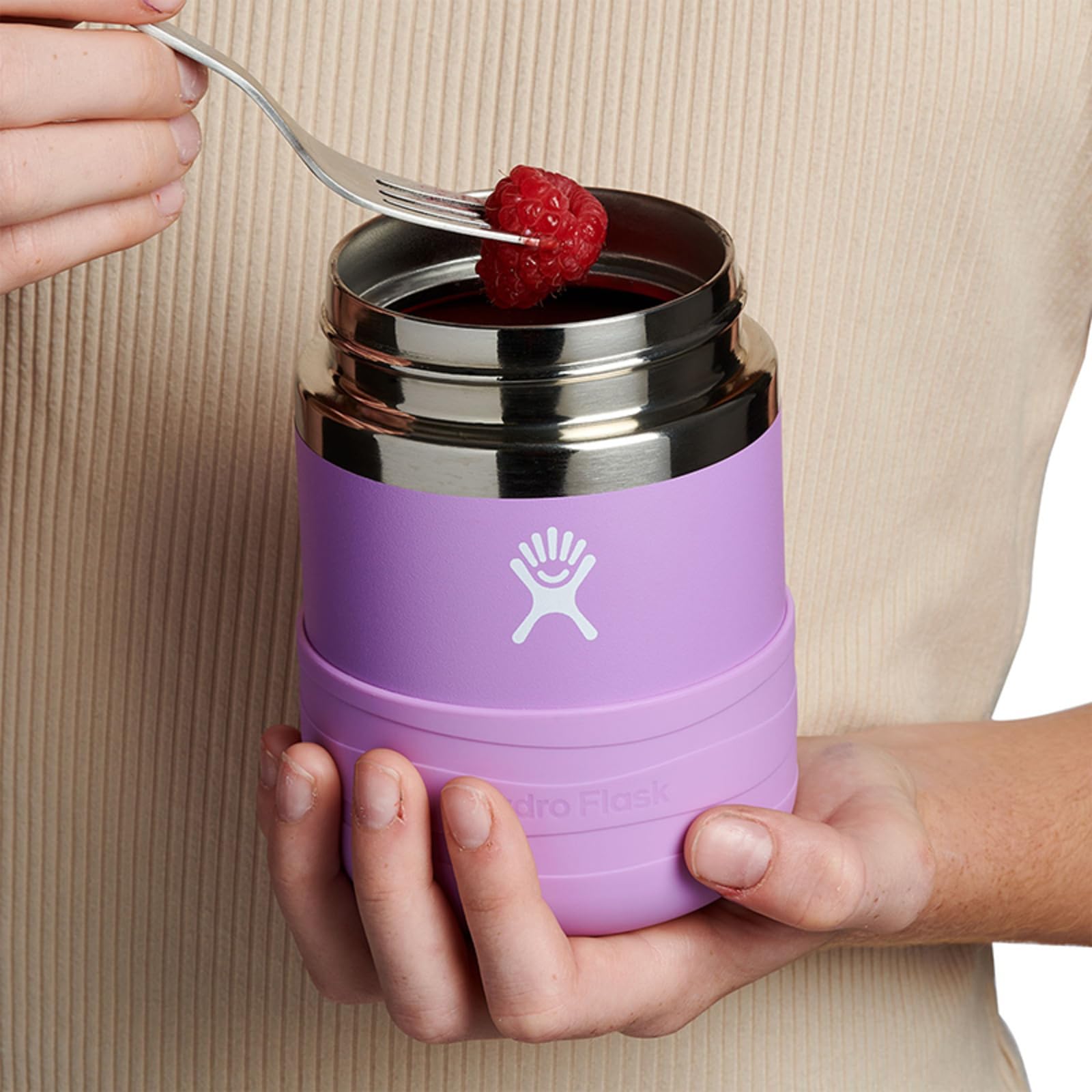 Hydro Flask in a child's backpack at lunch, leakproof and kid-friendly for outings