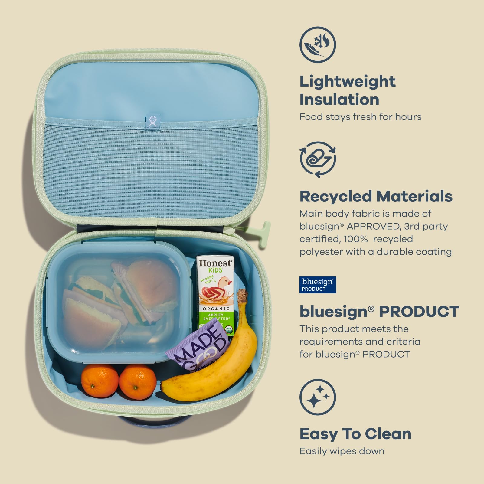 Hydro Flask lunch box on picnic blanket showing outdoor use and keeps-food-fresh benefit