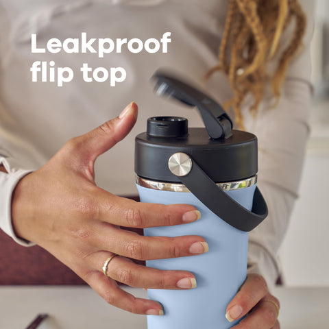 Hydro Flask held in hand showing 24 oz scale for portable hydration benefit