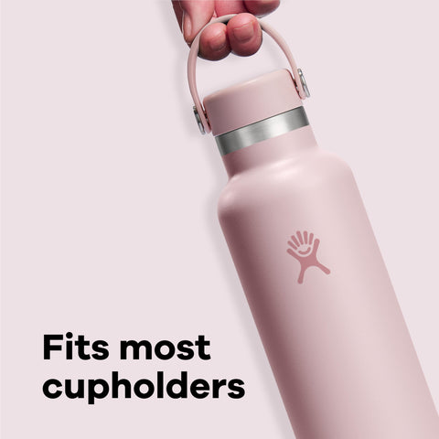 Hydro Flask bottle seated in cupholder demonstrating travel convenience and stability