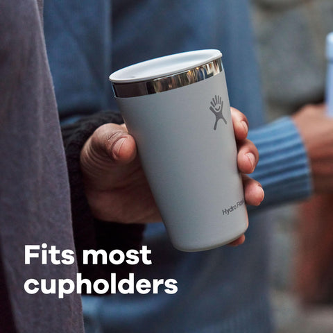 Hydro Flask tumbler seated in a car cupholder demonstrating on-the-go fit