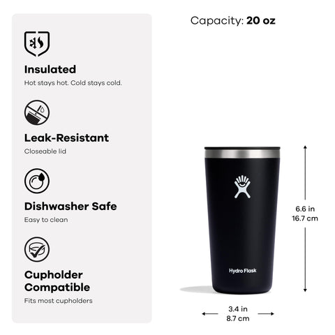 Hydro Flask tumbler held outdoors with coffee highlighting portable, insulated enjoyment