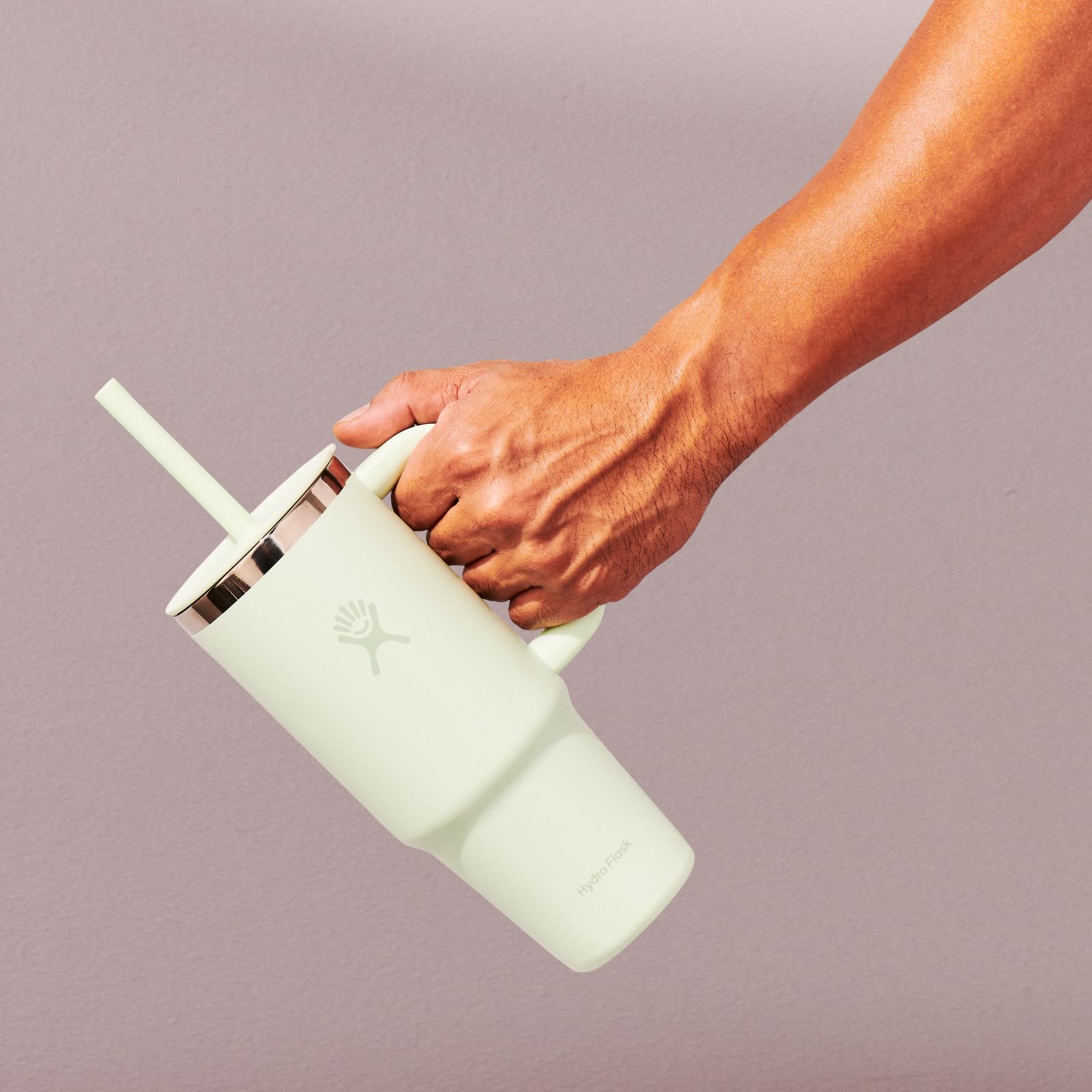 Hydro Flask shown next to phone and keys to demonstrate size benefit