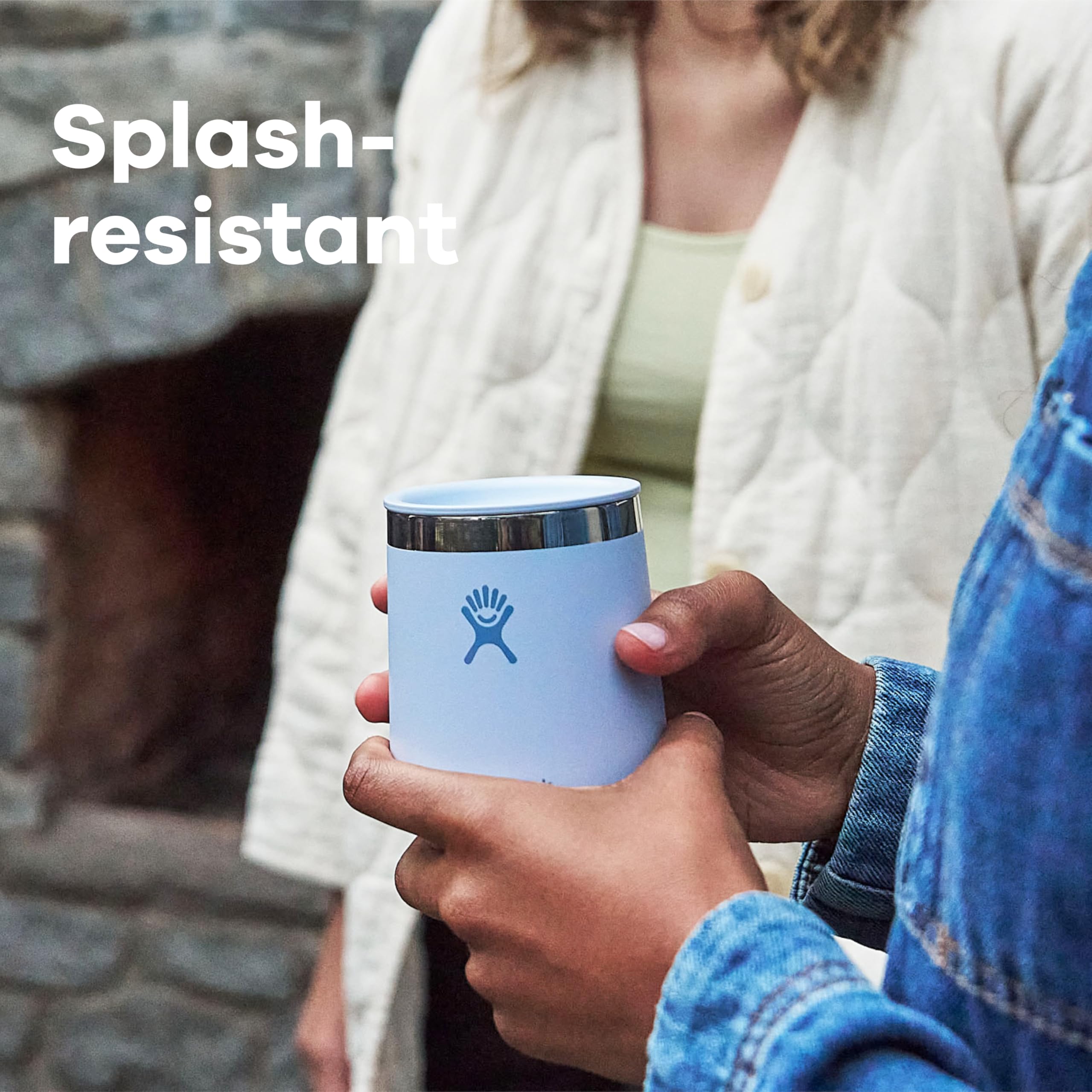 Hydro Flask next to standard wine glass showing 10 oz scale and practical size