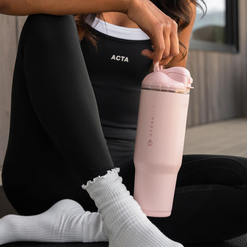 HydroJug Ease2o in a gym bag lifestyle shot for everyday portability