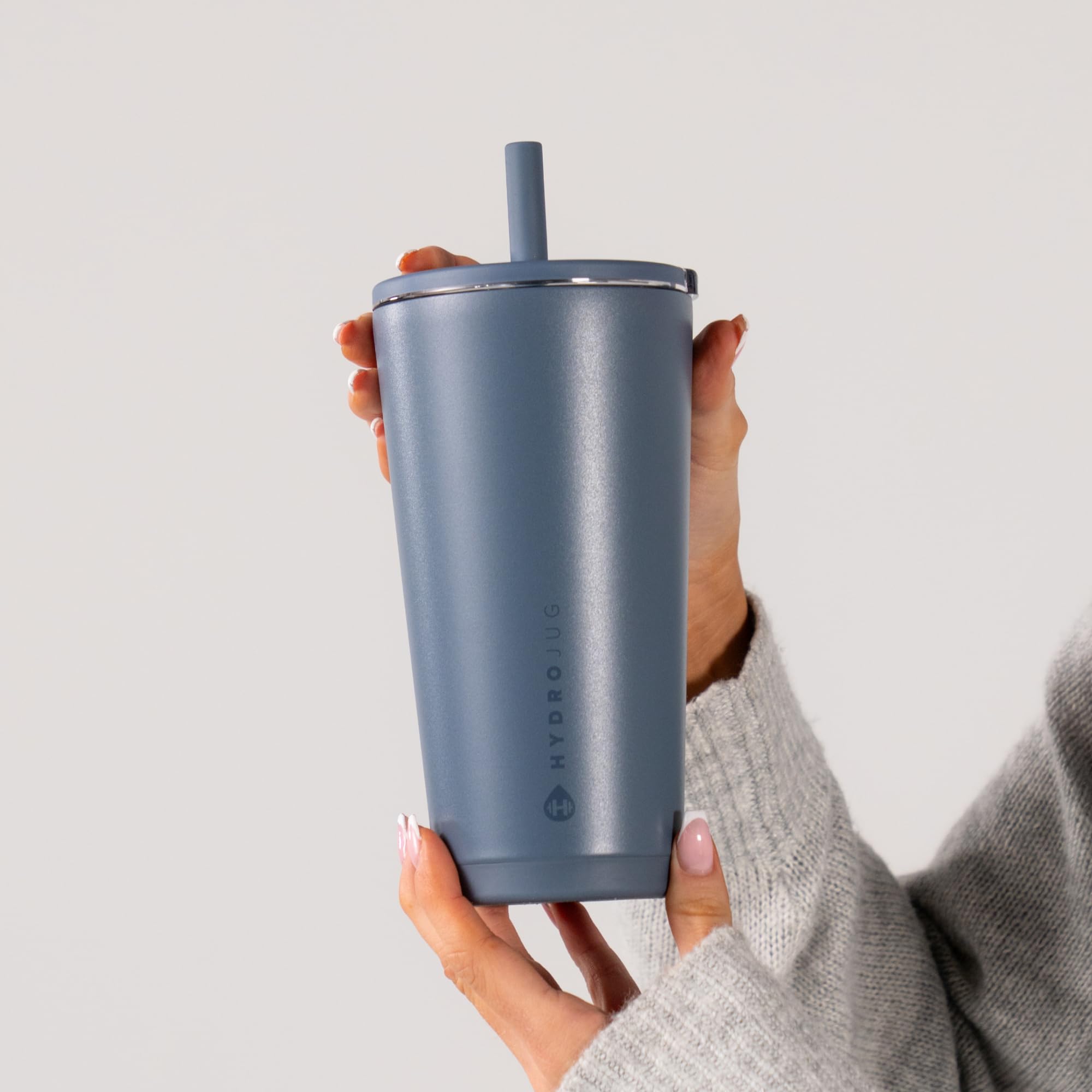 HydroJug rubber base seated on a desk to reduce noise and sliding