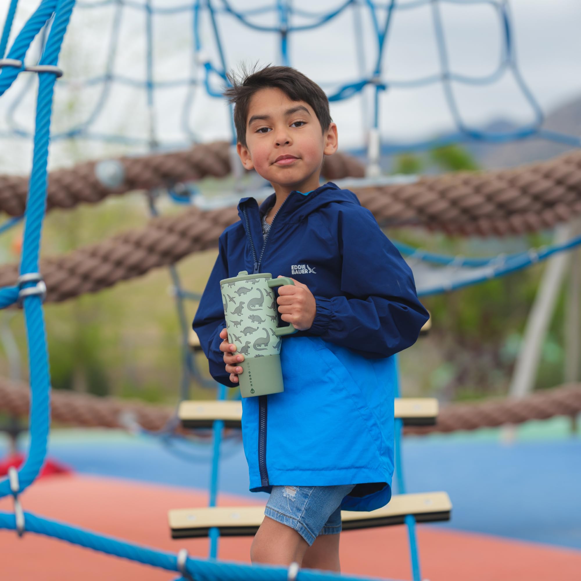 HydroJug held in a child hand to show 20oz size and portability