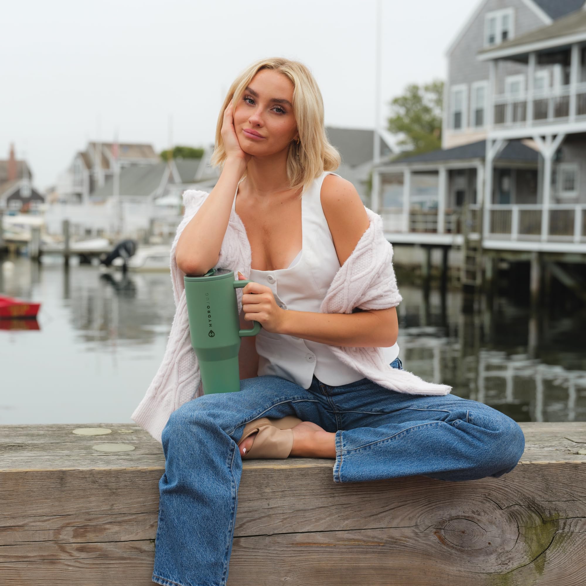 HydroJug Traveler in an outdoor setting illustrating portability and active-use benefit