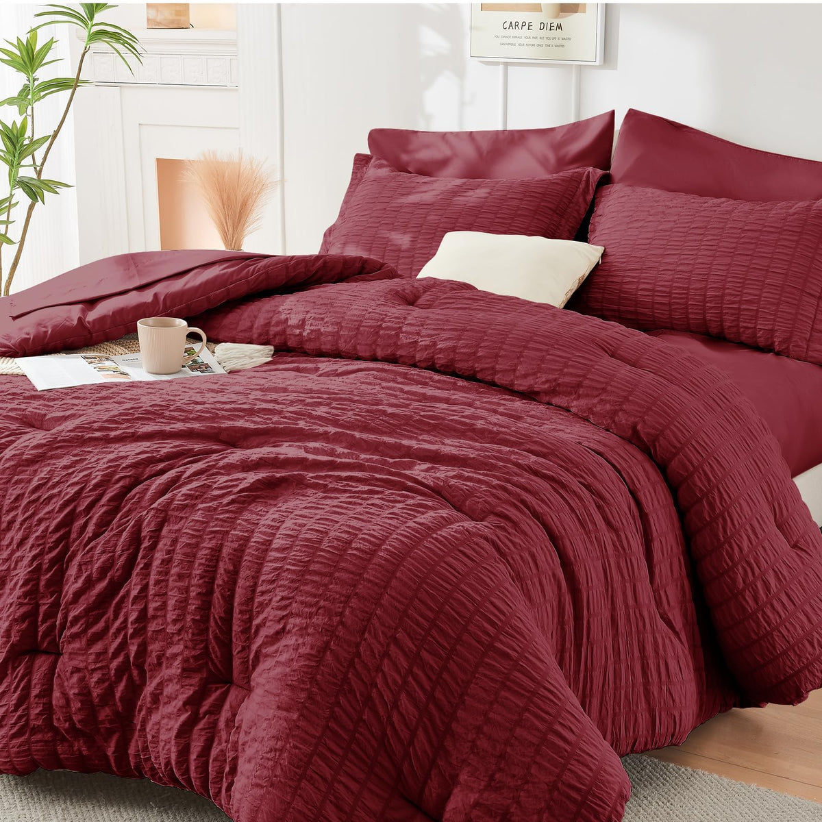 HYMOKEGE front view of burgundy queen bed with comforter showing elegant finish