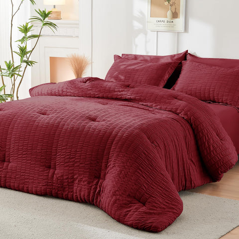 HYMOKEGE comforter on mattress showing full drape and queen size scale