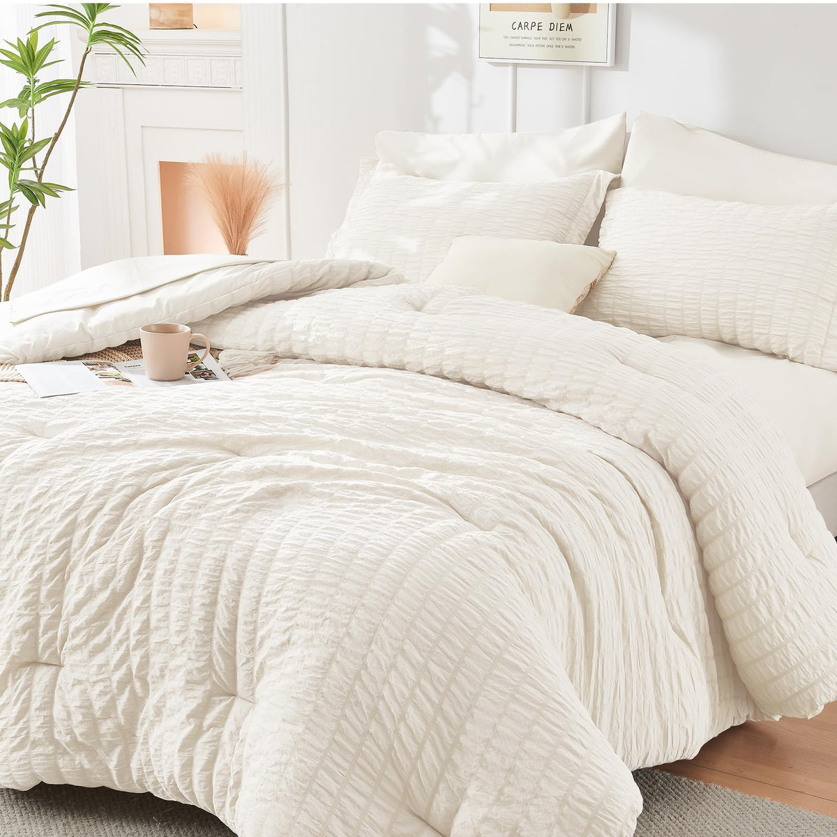 HYMOKEGE ivory comforter front view showing neat packaging and instant bedroom upgrade