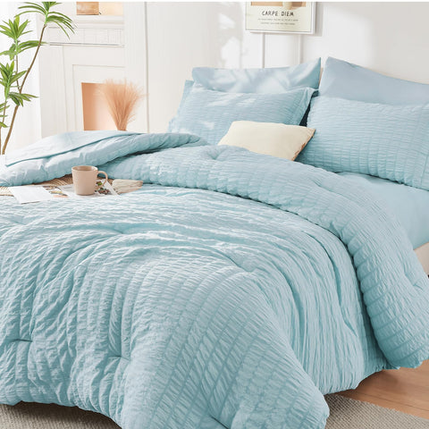 HYMOKEGE front view of lake blue seven-piece bedding set showing coordinated pieces