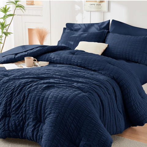HYMOKEGE front view of navy oversized comforter showing full-bed coverage and elegant color