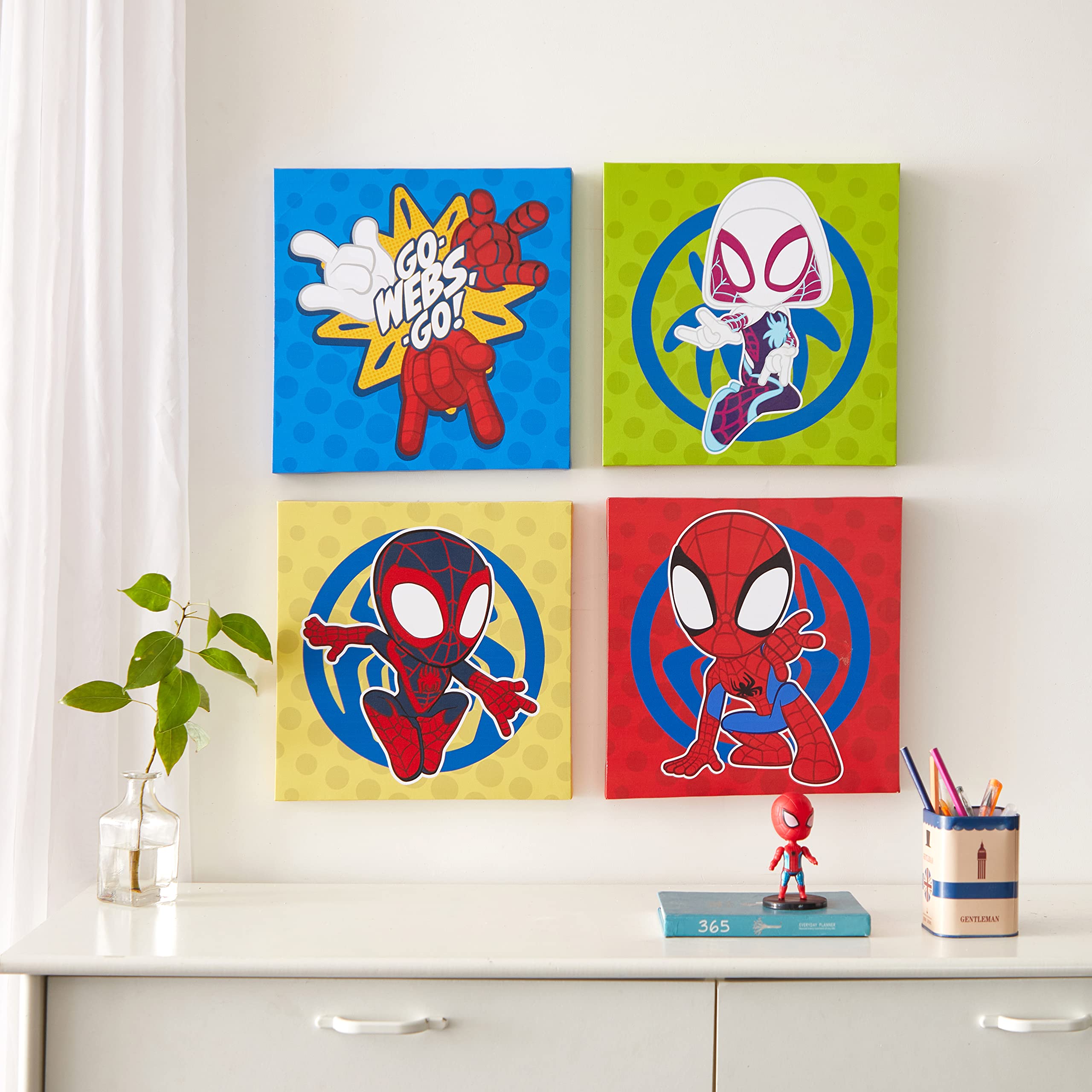 Idea Nuova front view showing four Spidey canvases and bright characters for instant room theme