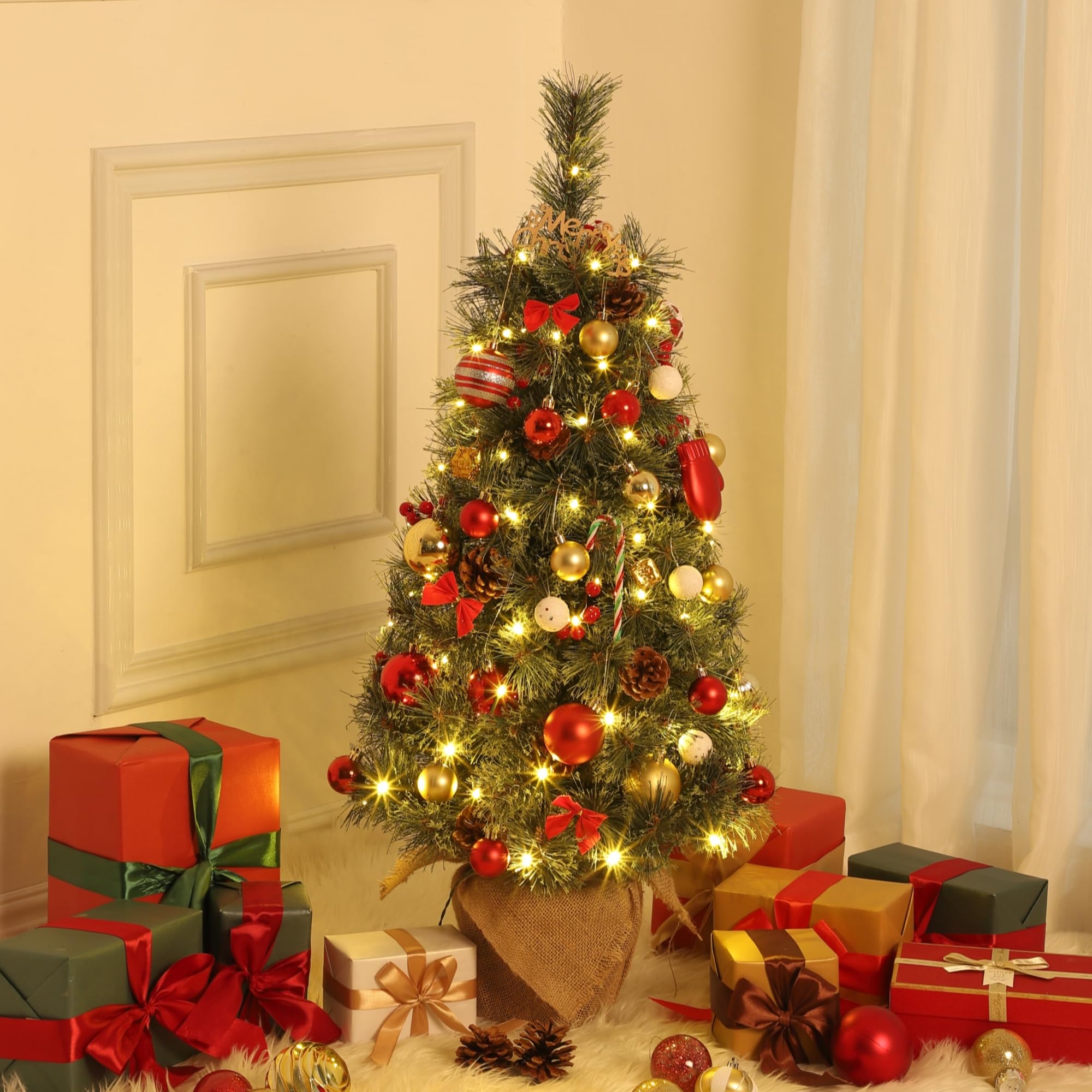 IDEALHOUSE detail of pine cones and red berries adding traditional festive charm