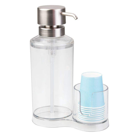iDesign dispenser next to toothbrushes to show compact size and fit