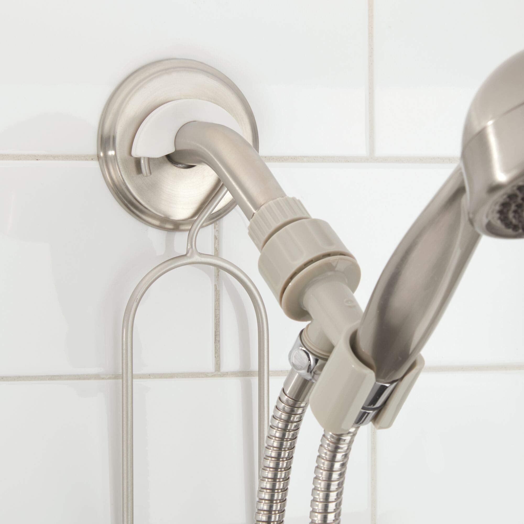 iDesign caddy in a styled shower highlighting tidy storage and easy access to toiletries