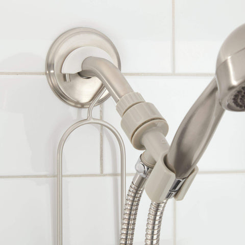 iDesign caddy in a styled shower highlighting tidy storage and easy access to toiletries