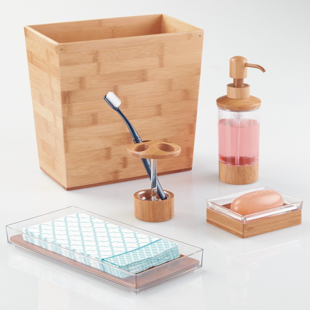 iDesign Formbu beside water bottle and book to show compact scale
