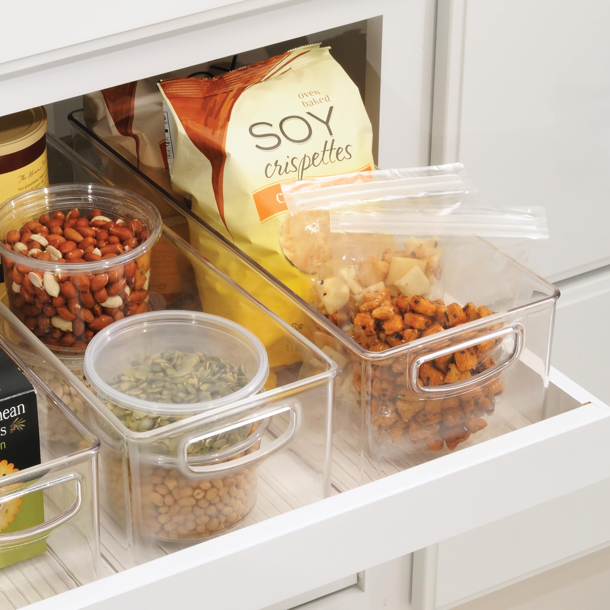 iDesign stacked bins on a pantry shelf saving vertical space and staying stable
