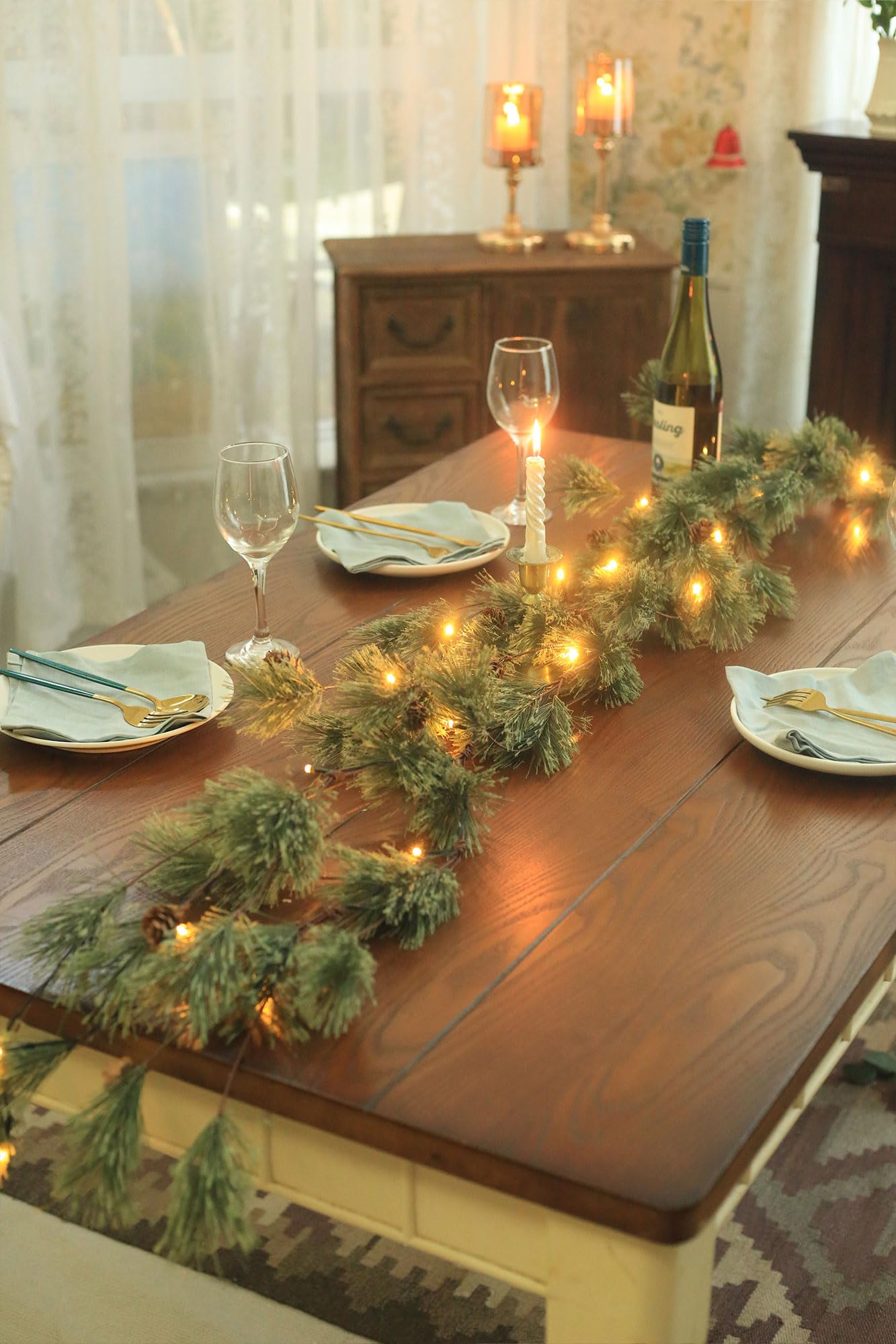 IDOGliitte+ pre-lit garland on a mantel with warm LEDs creating cozy ambiance