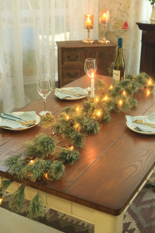 IDOGliitte+ pre-lit garland on a mantel with warm LEDs creating cozy ambiance