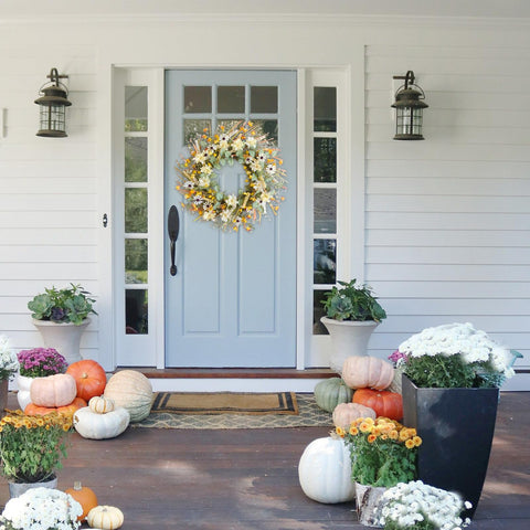 idyllic wreath on door with scale comparison showing ideal 22-inch size fit