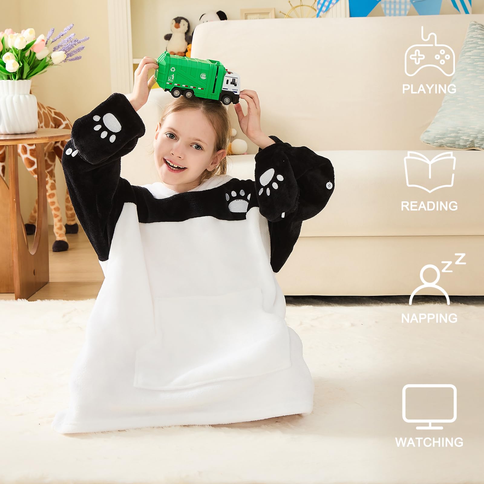 IFNOW lifestyle shot of child reading cozy in the panda hoodie