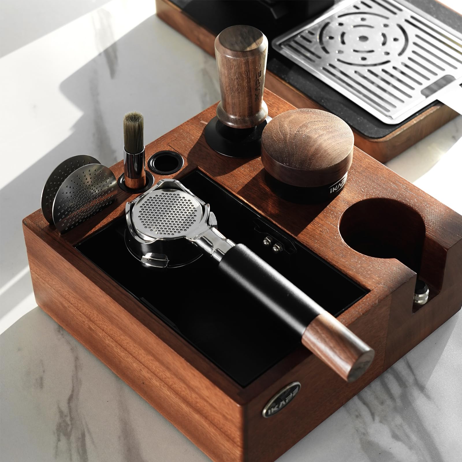 IKAPE portafilter resting slot secures portafilter and protects counter