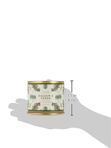 Illume balsam & cedar candle burning in room showing warm ambience and scent diffusion
