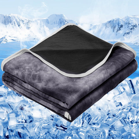 inhand front view king size cooling blanket shows full coverage and cooling benefit