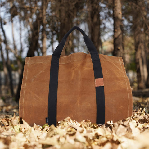 INNO STAGE tote placed by a fireplace adding rustic decor and functional storage