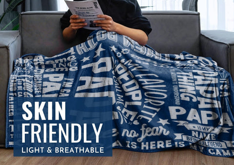 InnoBeta blanket draped on sofa with grandpa demonstrating comfort