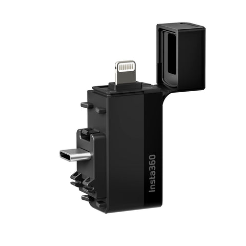 Insta360 Quick Reader beside a wallet to show compact size and travel convenience