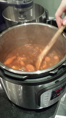 Instant Pot inner pot in cooker with cooked rice showing capacity and meal prep convenience
