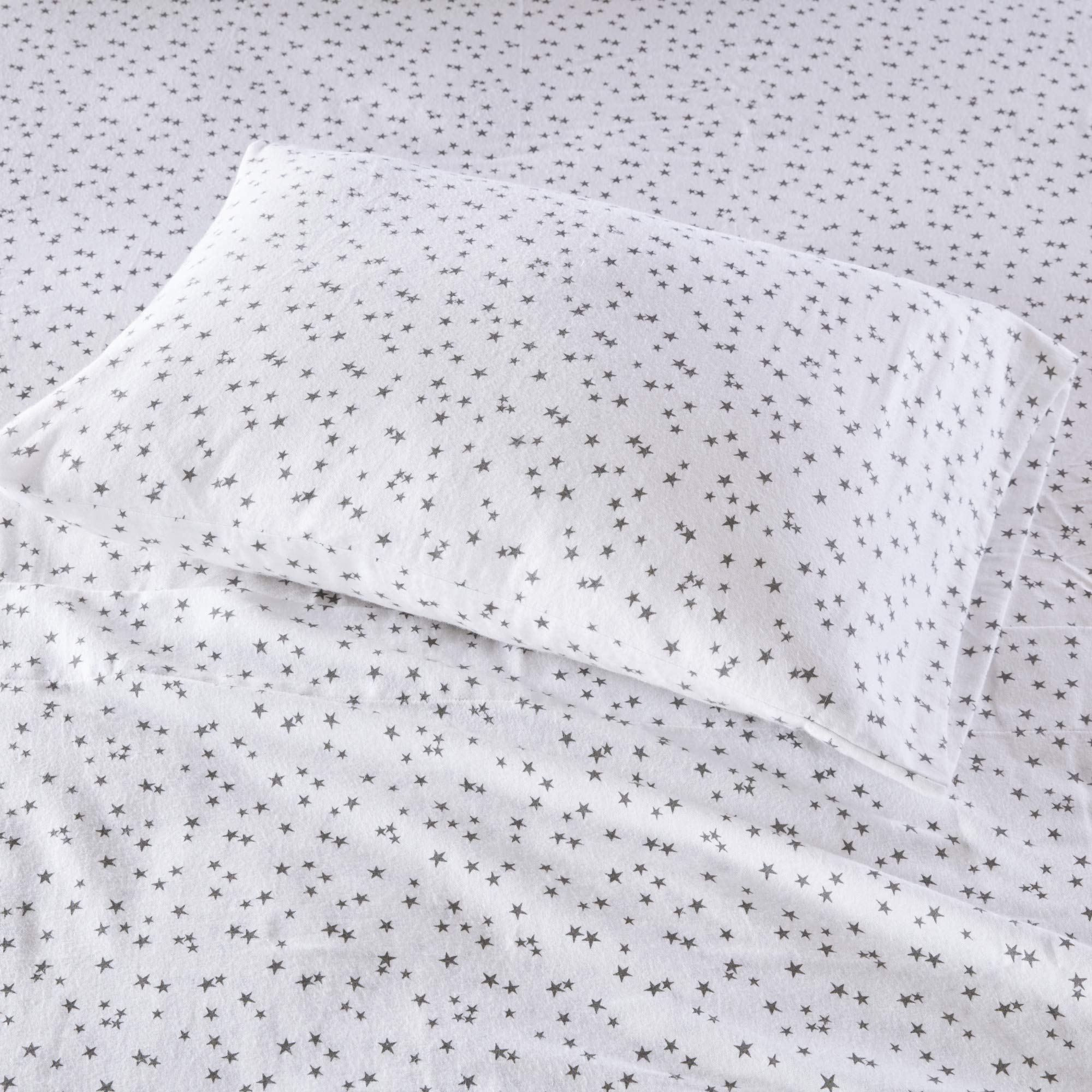Intelligent Design fitted sheet corner with elastic demonstrating secure fit and ease