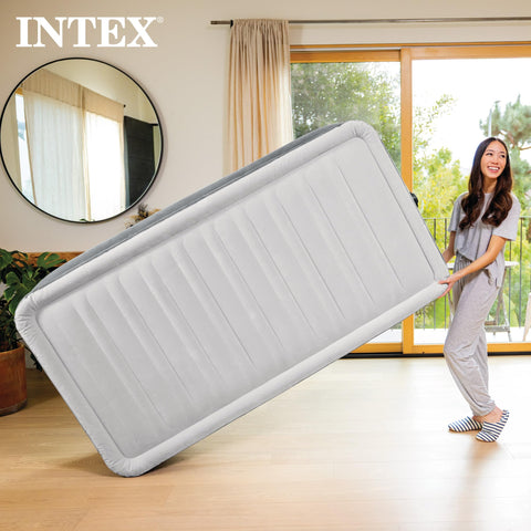 Intex Dura‑Beam next to a standard twin for size comparison showing true twin scale benefit