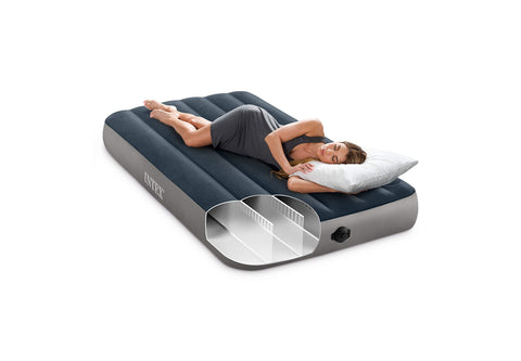 Intex mattress inflated at campsite demonstrating portability and comfort
