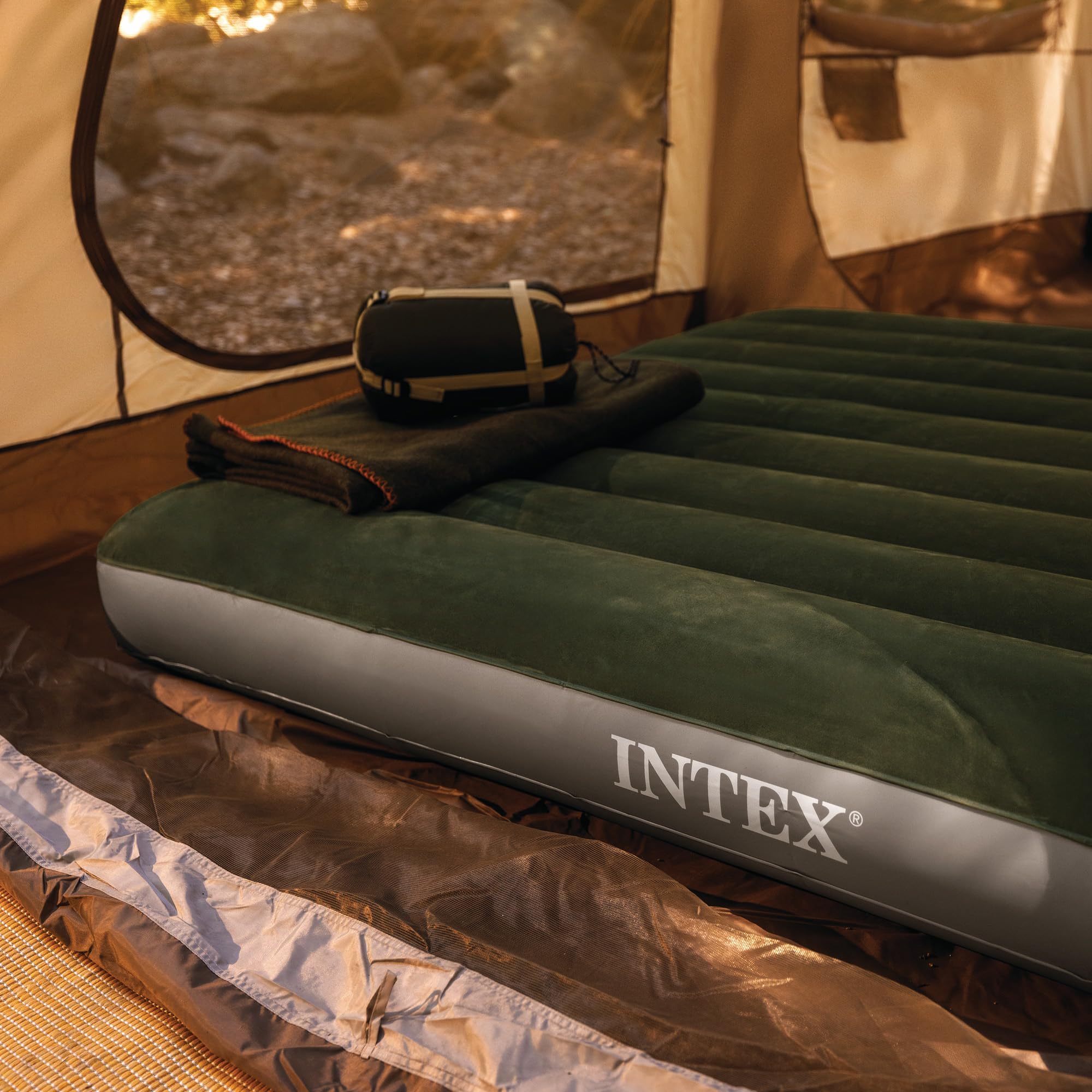 Intex rolled mattress and storage showing compact transport and quick setup benefit
