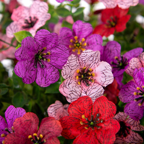 INXUGAO hanging basket displayed on a front porch offering year-round color without upkeep