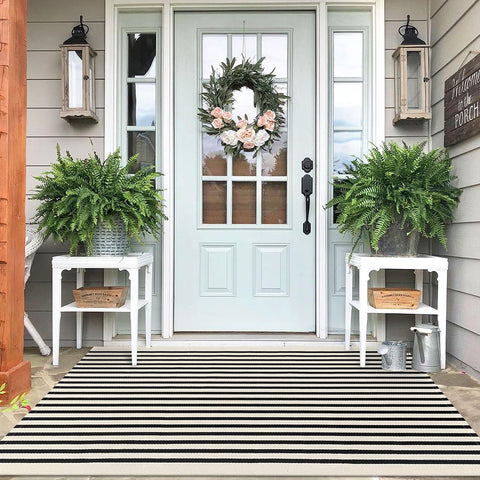 IOHOUZE front view of striped rug showing classic black beige design and curb appeal