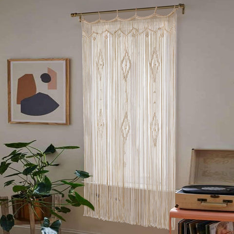 IOWER macrame curtain close-up of knots and cotton texture, highlights handmade detail