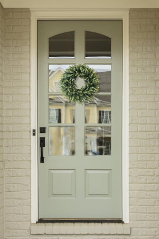 IPLNTS wreath packed for storage showing fold-free preservation and reusable design